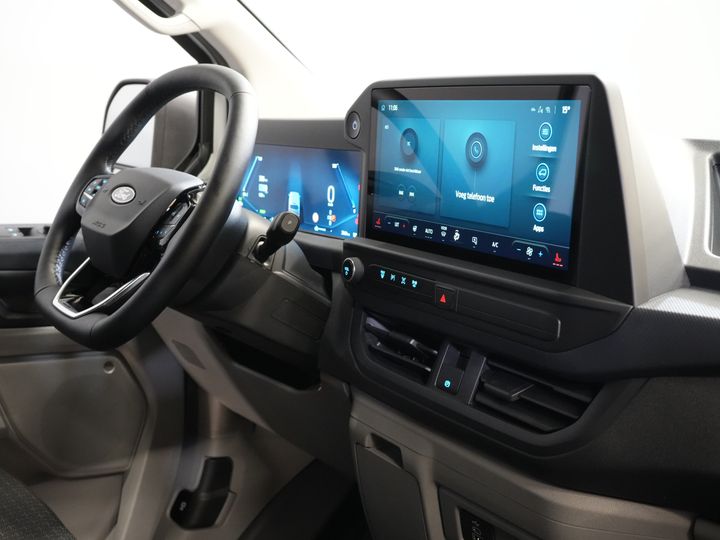 Ford E-Transit Custom Vans 340 L2 65 kWh 330 km WLTP 2.3t Amperaj remorcare/ Încărcător rapid/ LED/ Încălzire stand/ Volan/ Volan/ Parbriz/ Carplay/ Cameră/