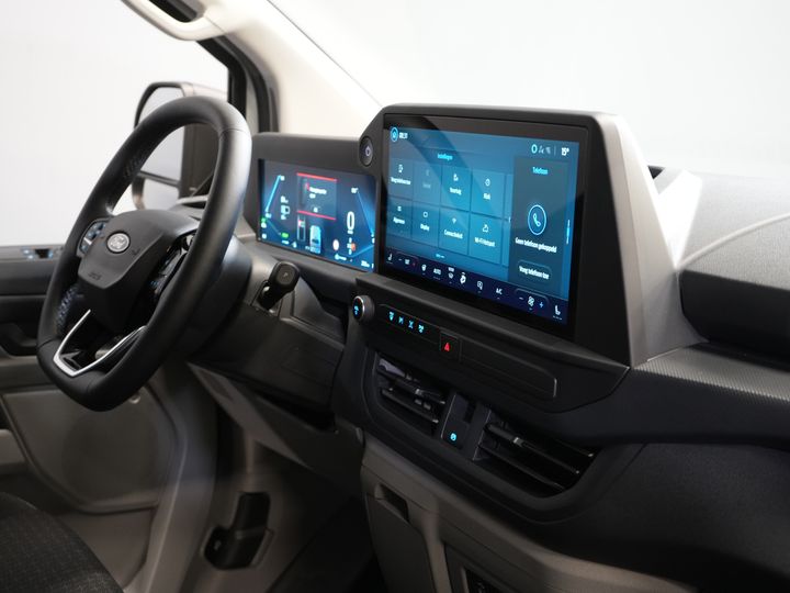 Ford E-Transit Custom Fourgon 320 Trend 65 kWh 330 km WLTP LED/ Chargeur rapide/ 2,3 t de capacité de remorquage/ Direction assistée/ Sièges chauffants/ Carplay/ Climatisation/ Caméra/ PDC/ Régulateur de vitesse